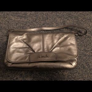 Silver coach clutch